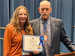 Brittanie Phillips accepts the Blue Ribbon Award from the Mining Safety and Health Administration on behalf of HSTC.